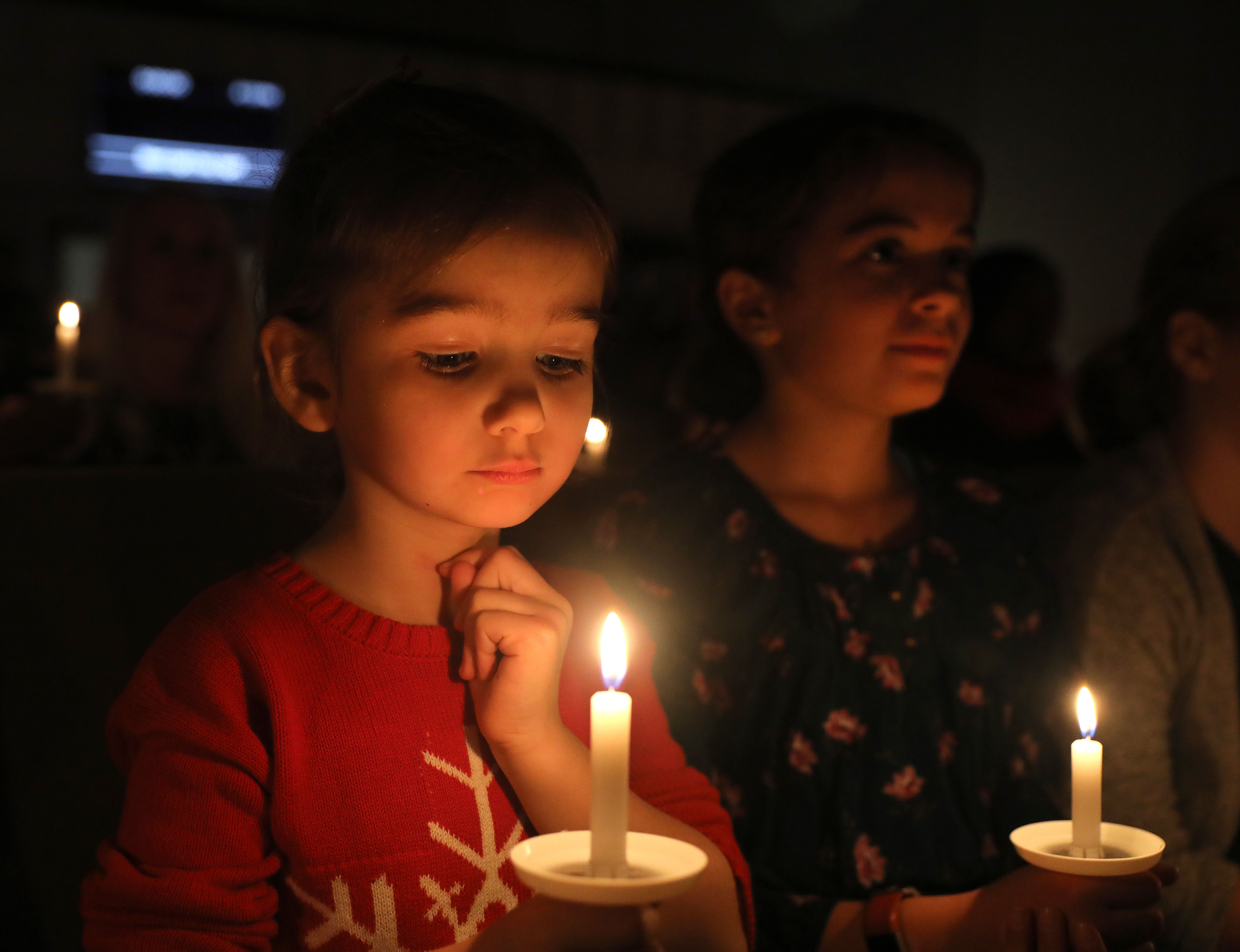 Candles And Hope Light Up Christmas Eve Services In Watertown The Boston Globe